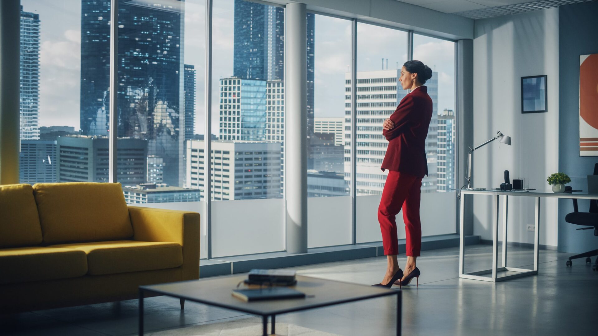 Woman looking out at city