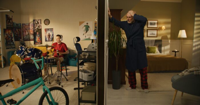 Young,Boy,Plays,On,Drum,Kit,At,Home.,Elderly,Man